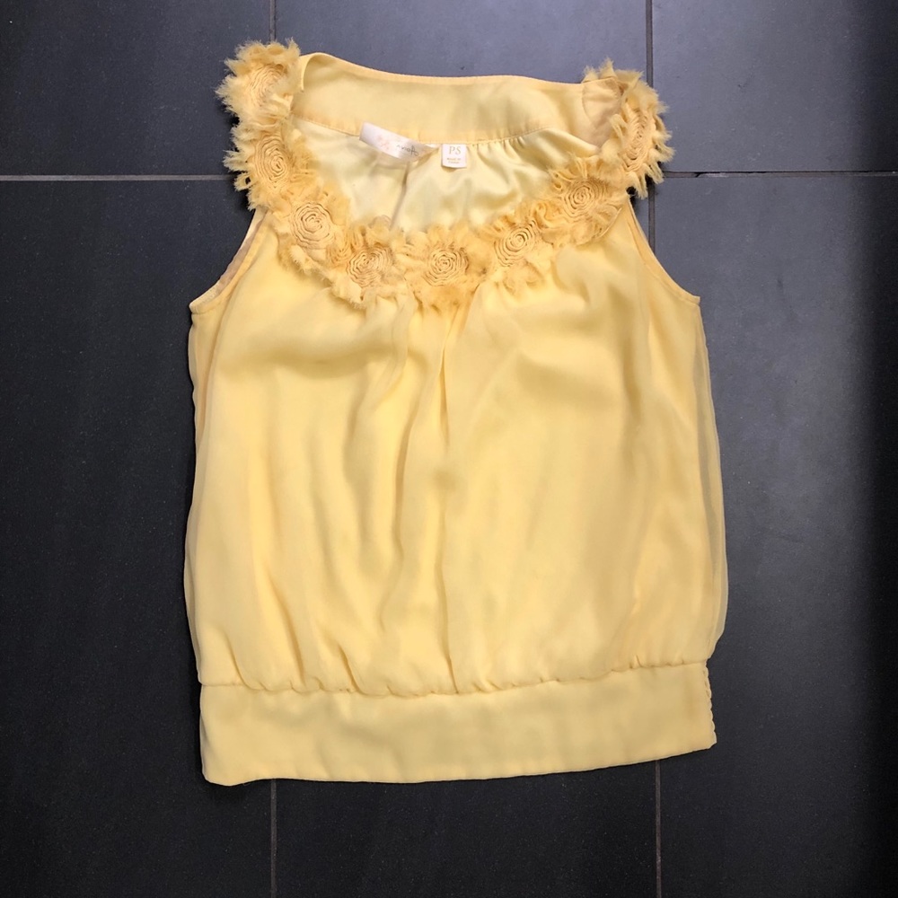 Pretty yellow sleeveless top with flowers